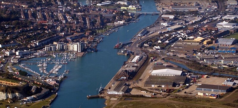 Newhaven from the air, its harbour and industrial estate along the river